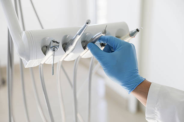 Professional Tooth Extraction technician working in Austin, TX